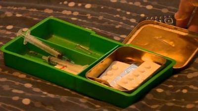 Box containing drug paraphenalia