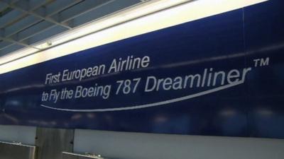 Lot sign saying "First European Airline to Fly the Boeing 787 Dreamliner"