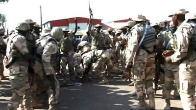 Nigerian soldiers prepare to go into northern Mali