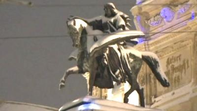 Austrian statue covered in snow