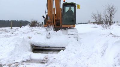 Clearing the snow