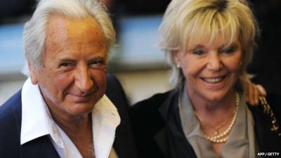 British film director Michael Winner (L) and his companion Geraldine Lynton-Edwards