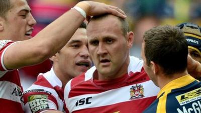 Gareth Hock celebrates after scoring against Leeds Rhinos