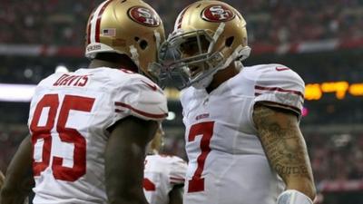 Vernon Davis #85 and Colin Kaepernick #7 of the San Francisco 49ers