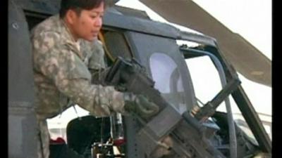 Female soldier with gun