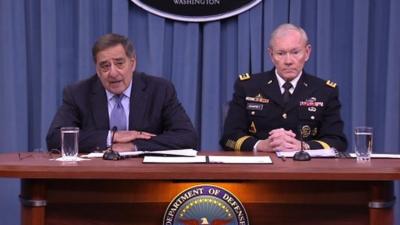 Leon Panetta and General Dempsey at a press conference 24 January 2013