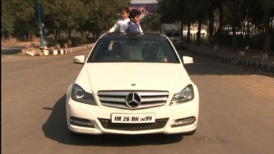 Mr Sehrawat in his Mercedses car