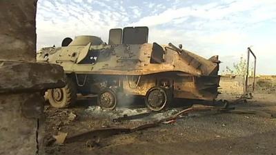 Damaged military vehicle