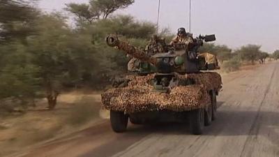 A tank drives through Mali