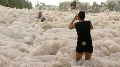 Australians in the sea foam