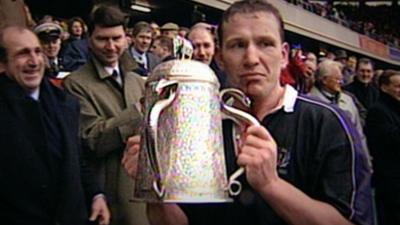 Andy Nicol lifts the Calcutta Cup at Twickenham