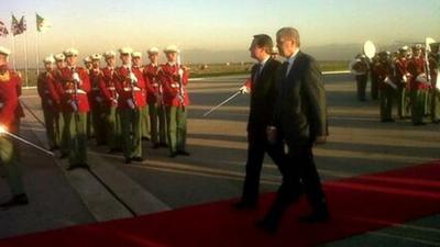 David Cameron on arrival, greeted by Algerian Prime Minister