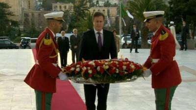 David Cameron lays a wreath as a mark of respect to the hostages who died in the In Amenas siege