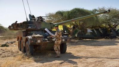 A French legionnaire works next to a Sagaie at Timbuktu airport after French-led forces recaptured the northern Malian desert city