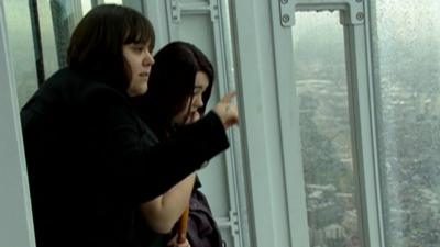 Women look out from Shard