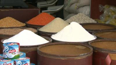 Piles of grains at market stall