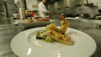 A plate of food in a restaurant kitchen