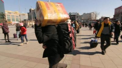 A travellers heading for a train station