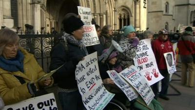 Protesters with banners