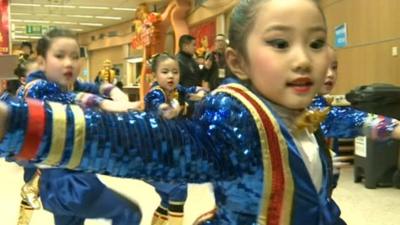 Children in China prepare for the New Year Gala