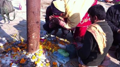 Pilgrims set up a makeshift temple