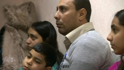 Asylum seeker Victor Schata-Michael and his family