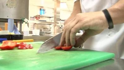 Chef cutting vegetables