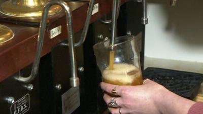Pint being pulled in pub