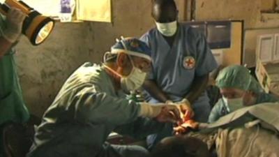 Red Cross medics operating