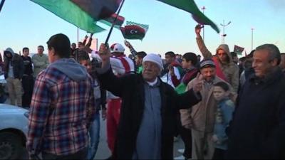 People waving flags