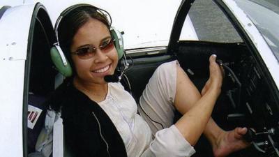 Jessica Cox in a cockpit