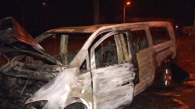 Burnt out car near Brussels Airport