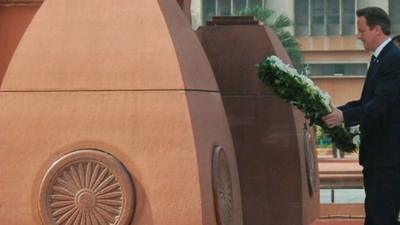 David Cameron laying wreath