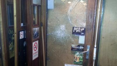 Smashed glass in Smoking Dog Pub, Lyon