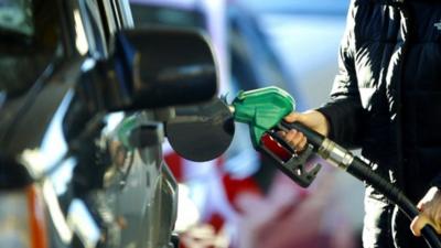 Man using petrol pump