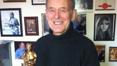 Norman Wanstall with his Oscar