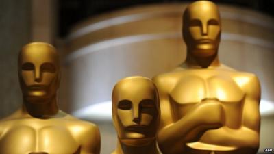 Oscar statues are viewed in preparation one day before the 85th Academy Awards in Hollywood, California