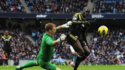 Manchester City's Joe Hart fouls Chelsea's Demba Ba