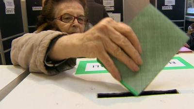 Woman casting her vote