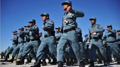 Afghan policemen march