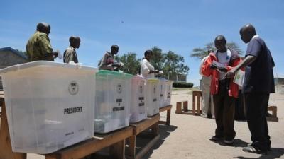 Kenyan voters take part in a mock-election at a polling station in Kajiad