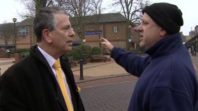 Liberal Democrat candidate Mike Thornton and a local resident