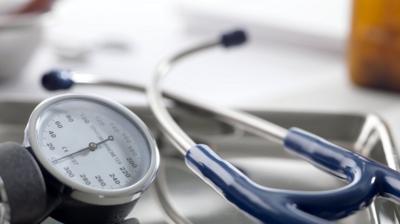 A sphygmomanometer and stethoscope