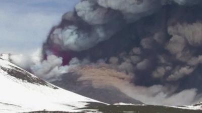 Clouds of ash above Mount Etna