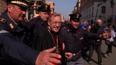 A cardinal arrives in the Vatican