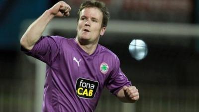 Mark Holland celebrates scoring for Cliftonville