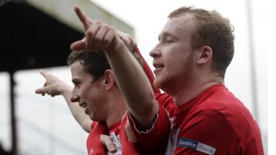 Cliftonville's Eamonn Seydak and Liam Boyce celebrate the victory over Kilmore in the Irish Cup