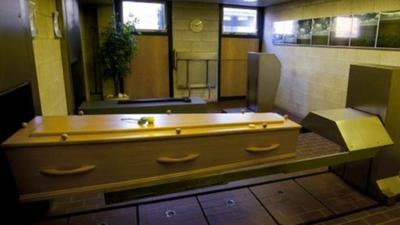 Coffin inside a crematorium