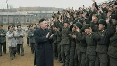 Kim Jong-un and members of the military