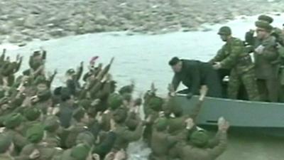 Soldiers wade into water to wave off Kim Jong-un